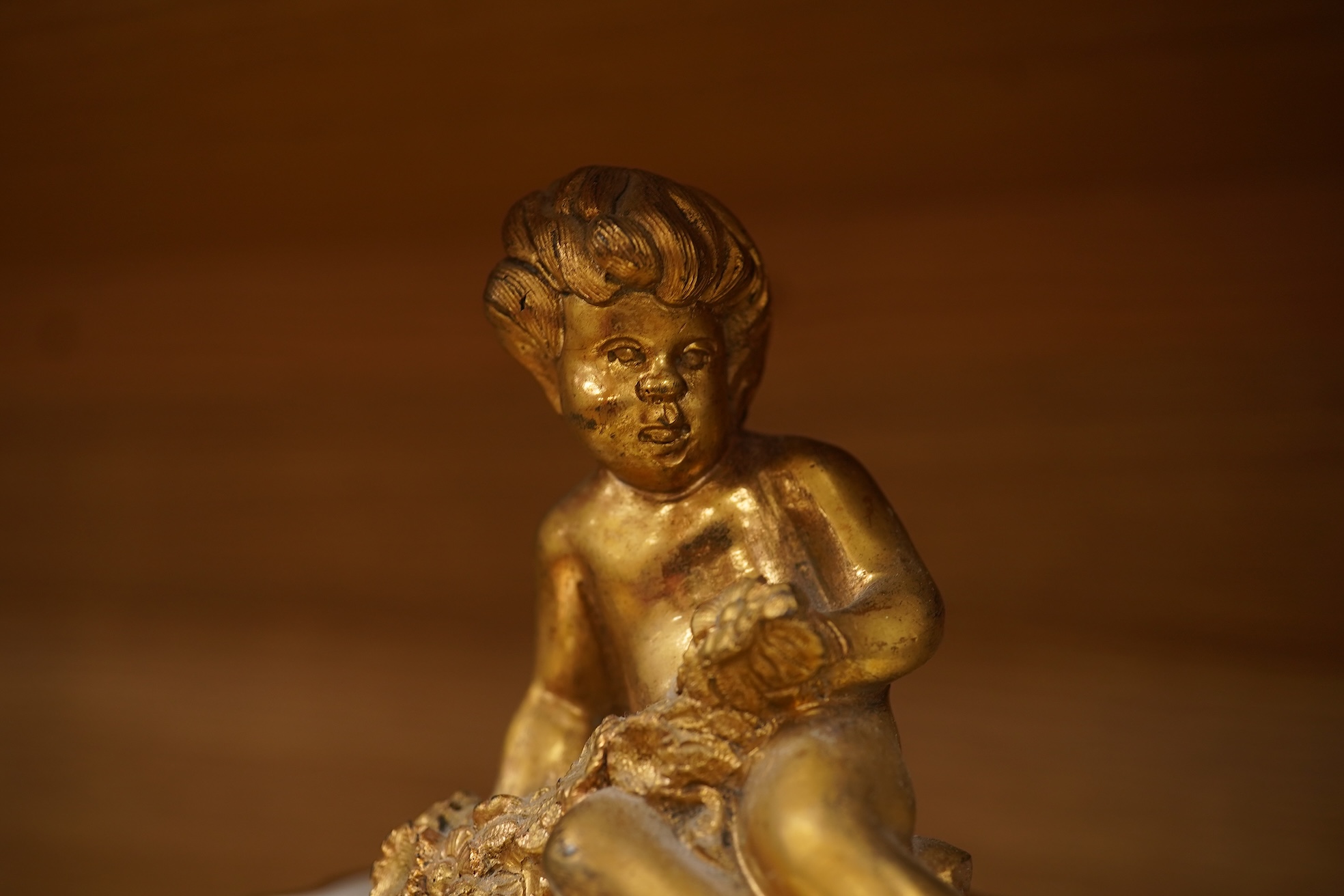 A 19th-century Sevres style porcelain mantel clock, 29cm tall